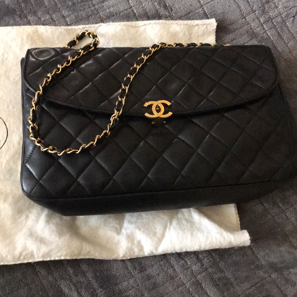 Chanel black classic lamb skin purse